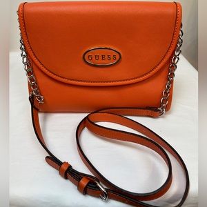 NWOT. Guess Orange Crossbody with Chain Shoulder Strap